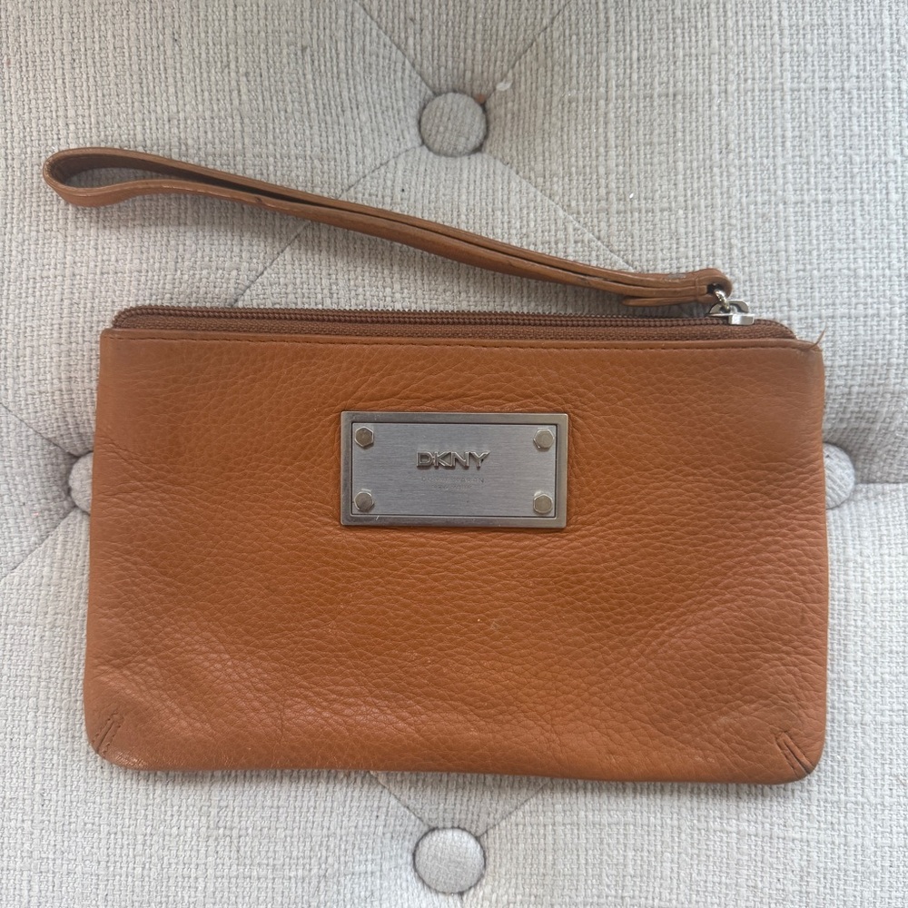 Donna Karan New York black leather pouch or wristlet with leather strap handle
